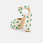 Back view of DUHA Palmdance beige showing ankle strap and embroidered block heel