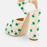 Back view of DUHA Palmdance beige showing ankle strap and embroidered block heel