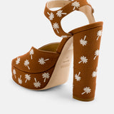 Back view of DUHA Palmdance caramel showing ankle strap and embroidered block heel