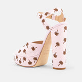 Back view of DUHA Palmdance pink showing ankle strap and embroidered block heel