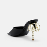 Back view of DUHA Palmira Mule black showing 10.5cm gold  palm tree heel.