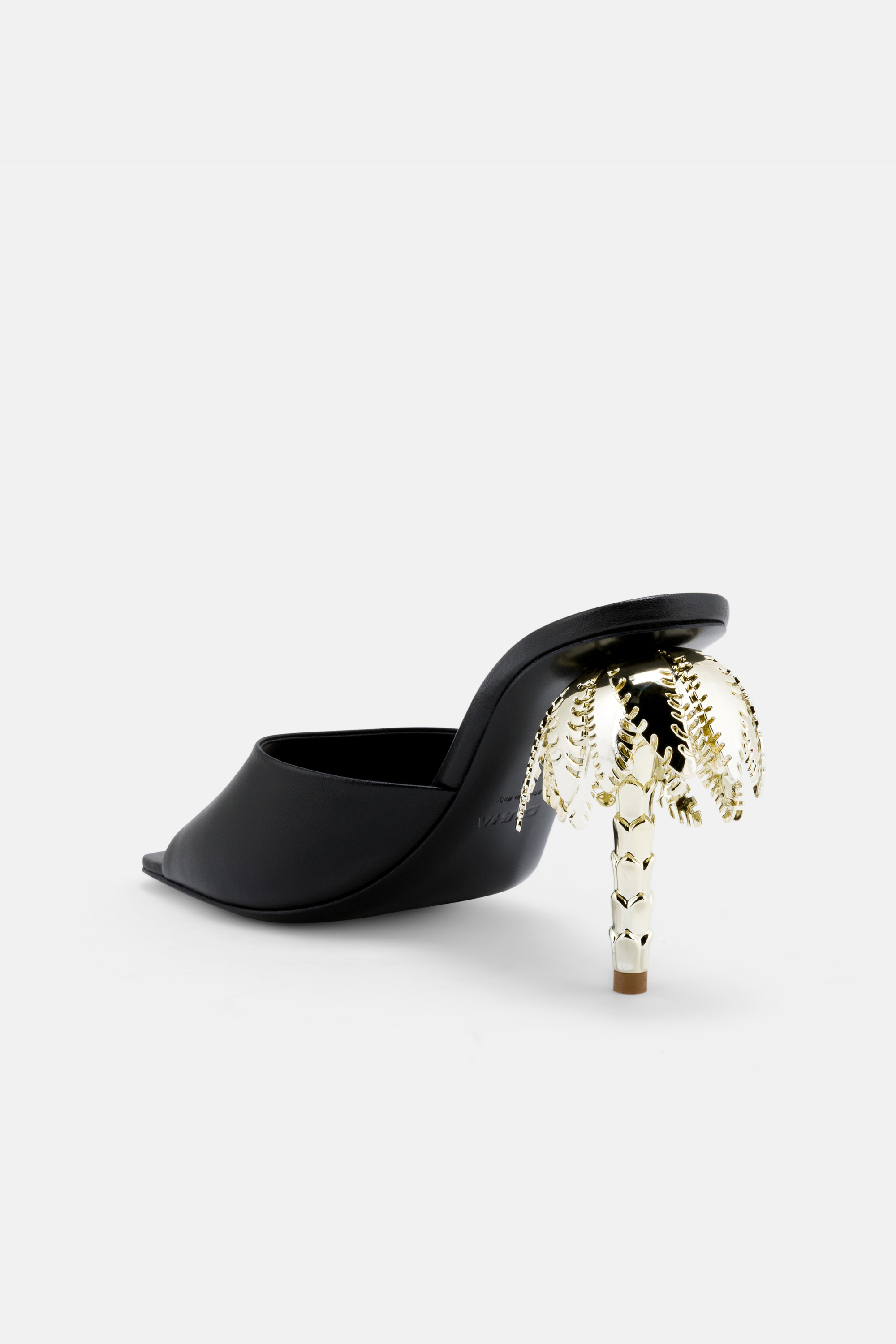 Back view of DUHA Palmira Mule black showing 10.5cm gold  palm tree heel.