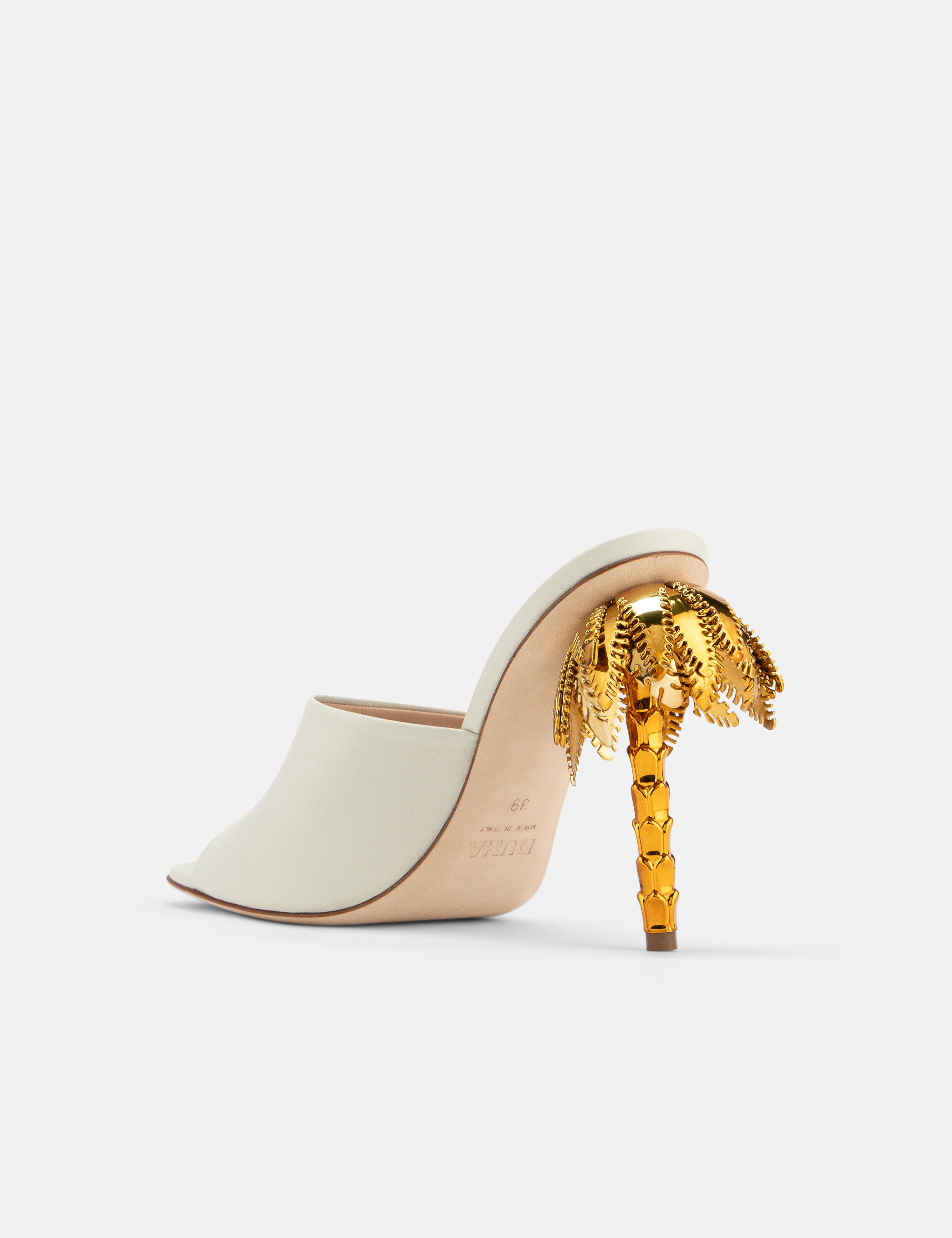 Back view of DUHA Palmira Mule coconut showing gold palm tree heel detail