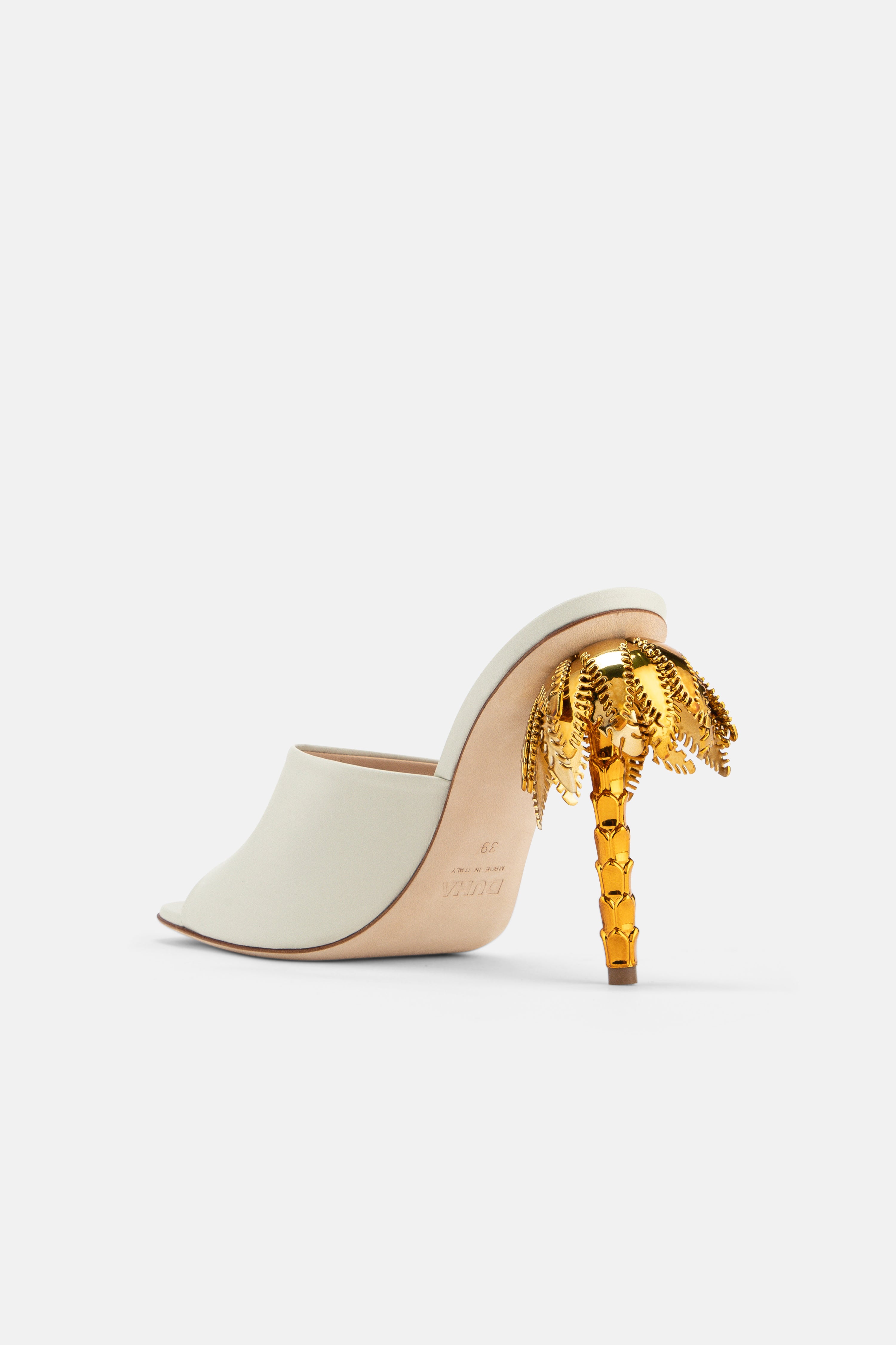 Back view of DUHA Palmira Mule coconut showing gold palm tree heel detail