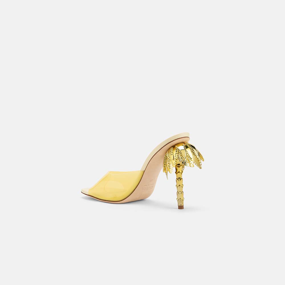 Back view of DUHA Palmira Mule light yellow patent showing gold palm tree heel