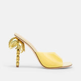 Side view of DUHA Palmira Mule light yellow patent — Italian designer sculptural heel mule