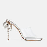 Side view of DUHA Palmira Mule transparent PVC — Italian designer sculptural heel mule
