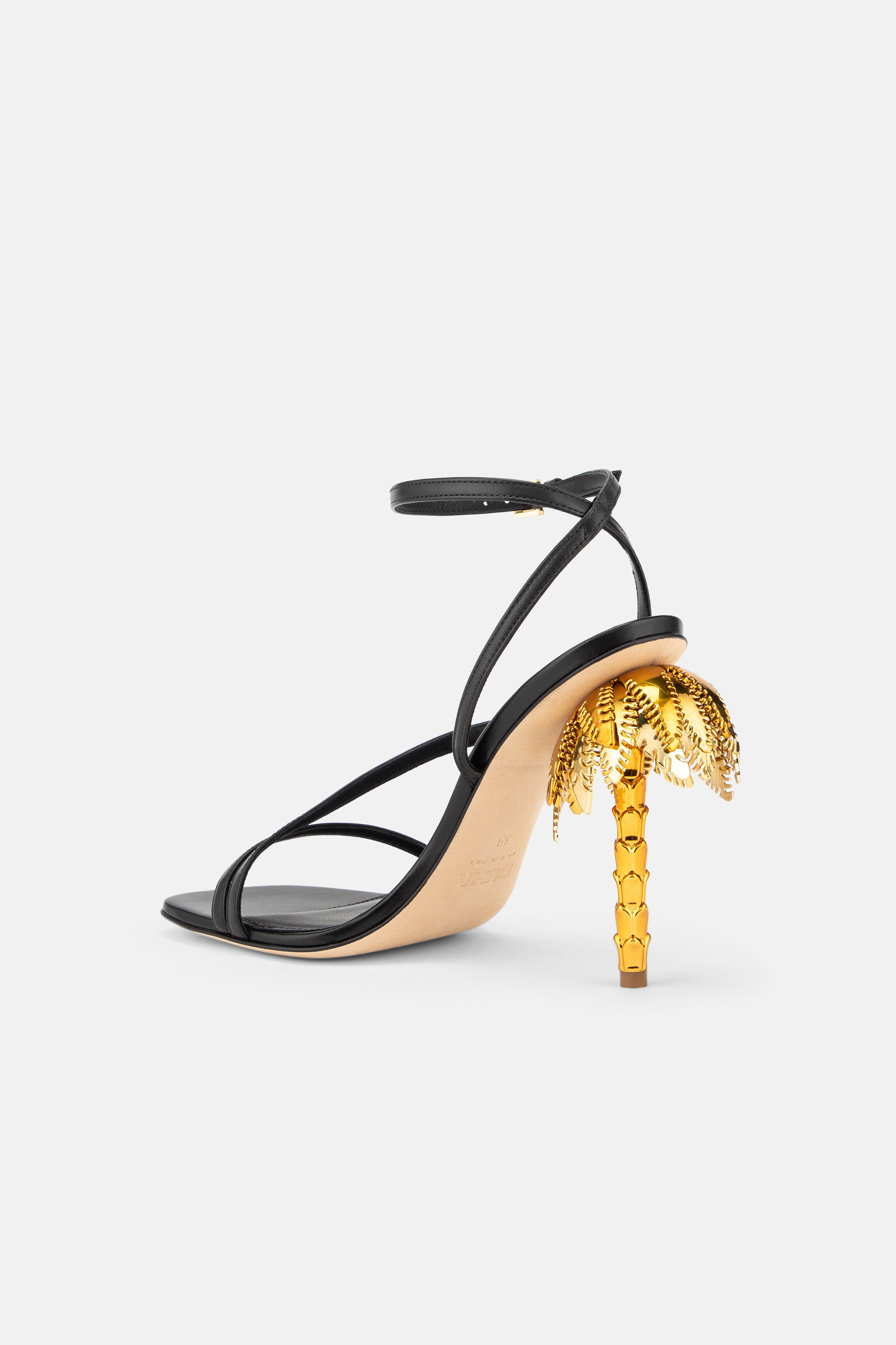 Back view of DUHA Palmira Sandal black showing ankle strap and gold palm tree heel