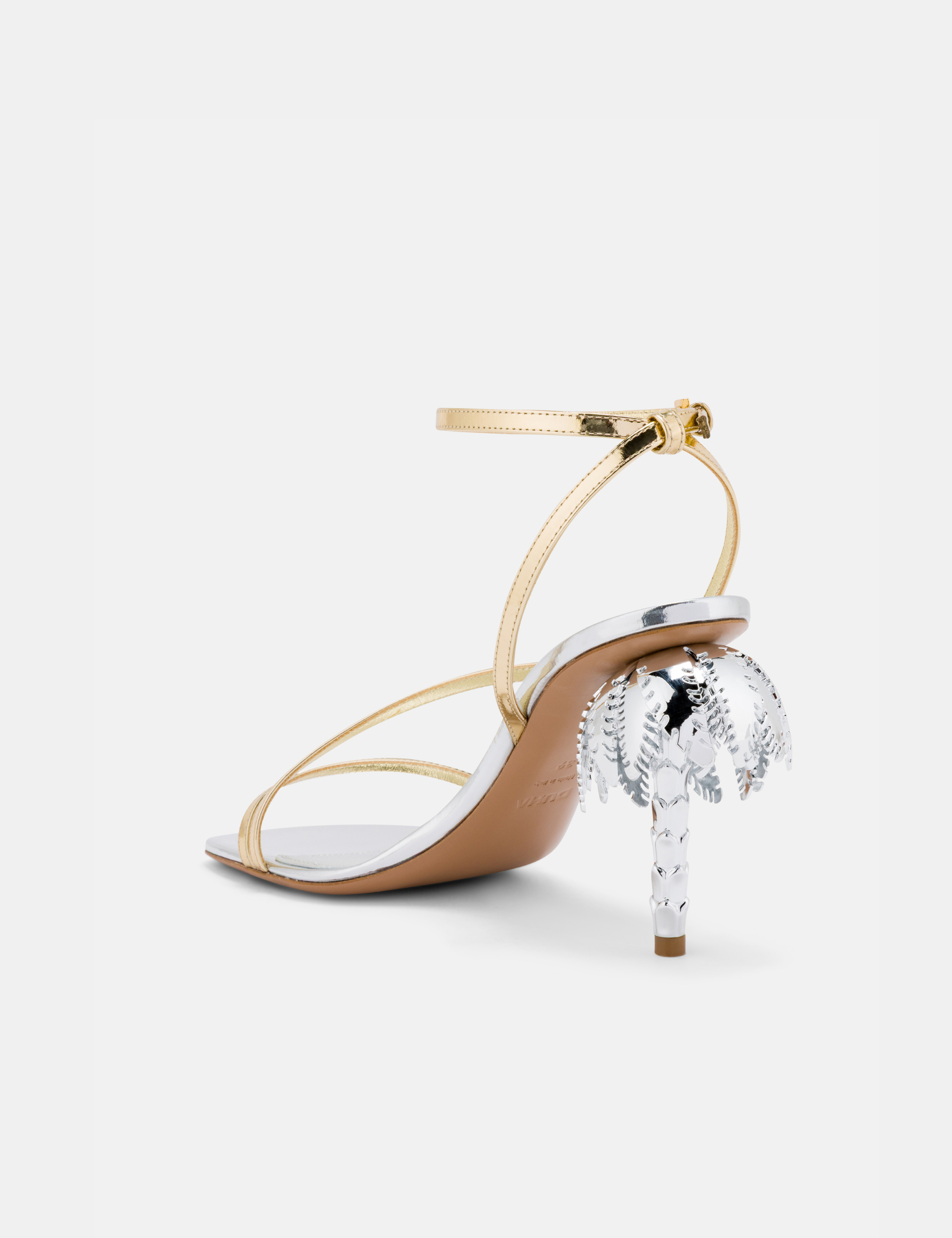 Back view of DUHA Palmira Sandal silver gold showing ankle strap and palm tree heel