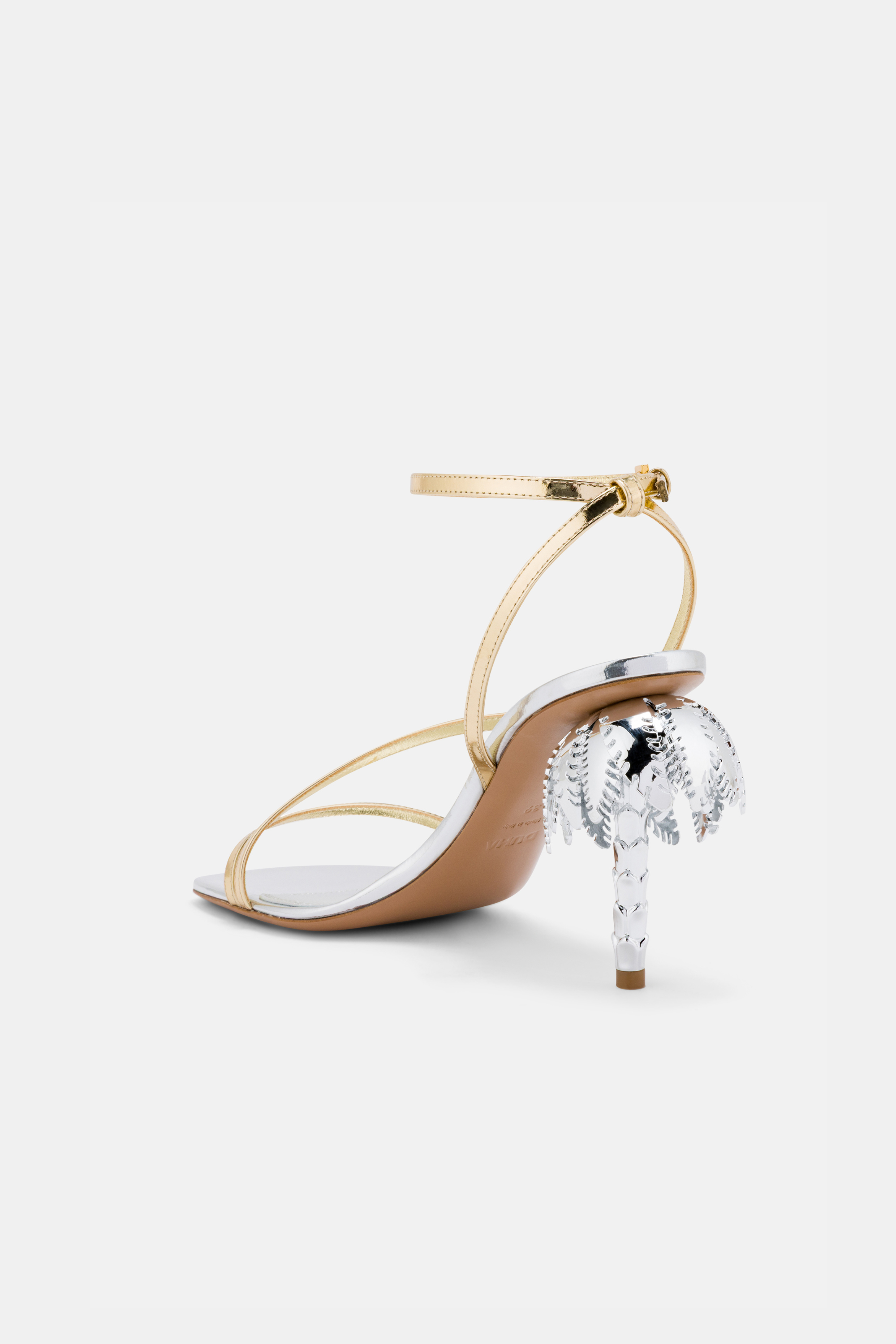 Back view of DUHA Palmira Sandal silver gold showing ankle strap and palm tree heel