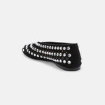 Close-up of mixed-cut crystal embellishment and circular 
cutouts on DUHA Yasmin black flat